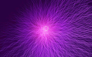 Wizualizacja symbolizująca energię jądrową w formie promieni światła